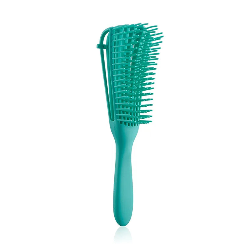 Cepillo Desenredante Profesional | Ideal para cabello rizado, grueso o con nudos. Su diseño flexible tipo “pulpo” masajea el cuero cabelludo, reduce el quiebre y deja tu pelo suave y manejable.