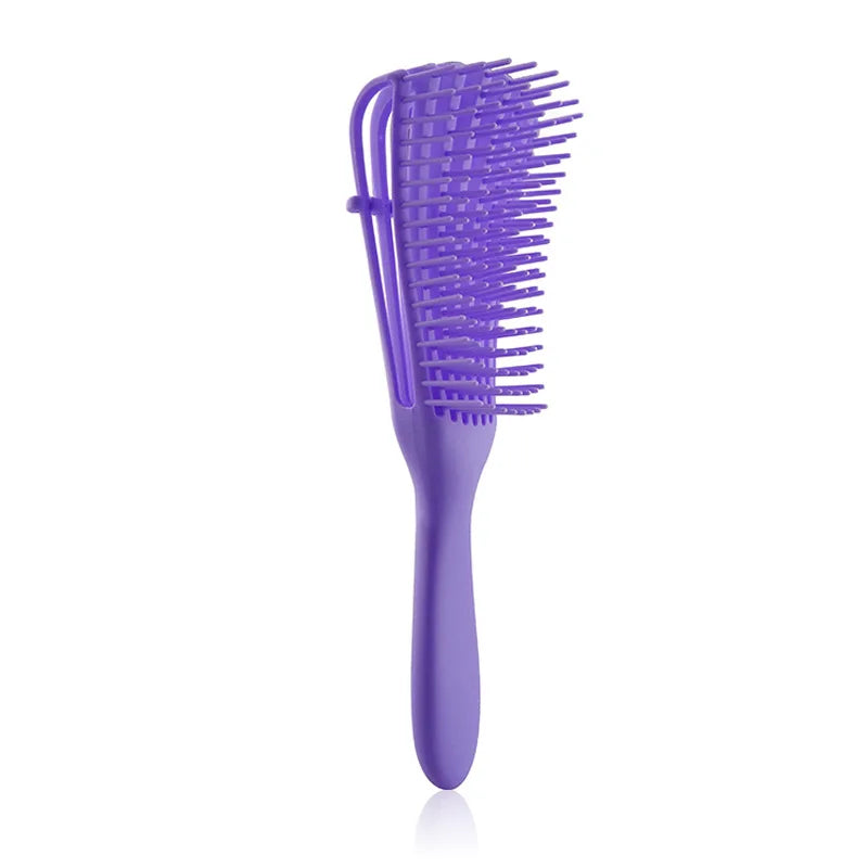 Cepillo Desenredante Profesional | Ideal para cabello rizado, grueso o con nudos. Su diseño flexible tipo “pulpo” masajea el cuero cabelludo, reduce el quiebre y deja tu pelo suave y manejable.
