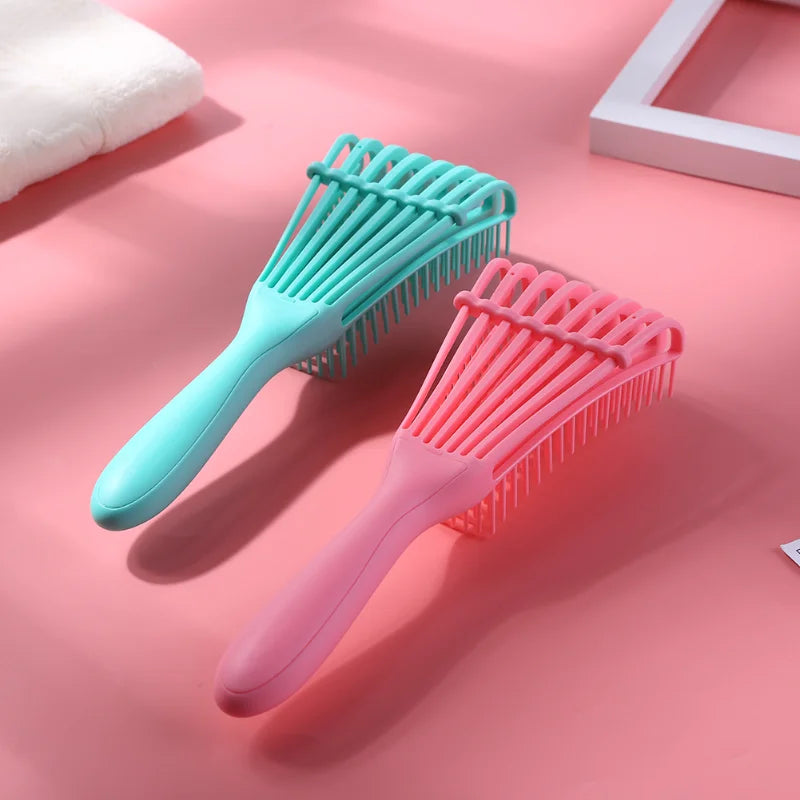 Cepillo Desenredante Profesional | Ideal para cabello rizado, grueso o con nudos. Su diseño flexible tipo “pulpo” masajea el cuero cabelludo, reduce el quiebre y deja tu pelo suave y manejable.