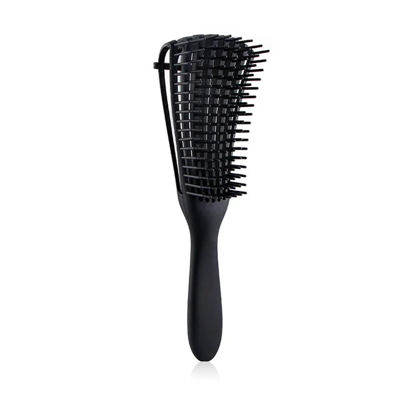 Cepillo Desenredante Profesional | Ideal para cabello rizado, grueso o con nudos. Su diseño flexible tipo “pulpo” masajea el cuero cabelludo, reduce el quiebre y deja tu pelo suave y manejable.