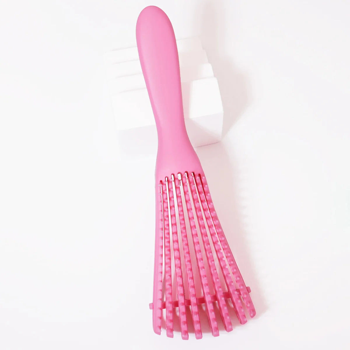 Cepillo Exfoliante Ajustable | Para cualquier tipo de cabello, especial para pelo rizo. Sus cerdas regulables desenredan suavemente, estimulan el cuero cabelludo y se pueden usar tanto en cabello seco como húmedo, dejando un